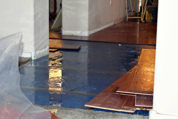 Professional Flood Damage Restoration technician working in Port Edwards, WI